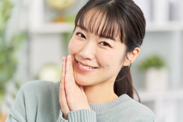 istock A woman with good teeth who whispers 2149079438