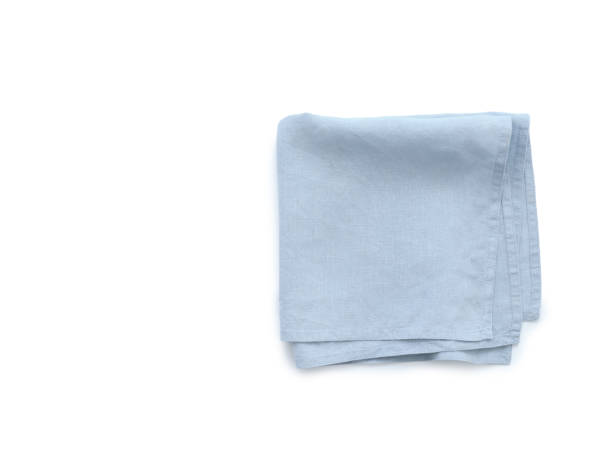 istock Flat lay with blue linen kitchen napkin isolated on white background. Folded cloth for mockup 2149081420