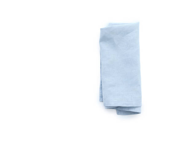 istock Flat lay with blue linen kitchen napkin isolated on white background. Folded cloth for mockup 2149081436