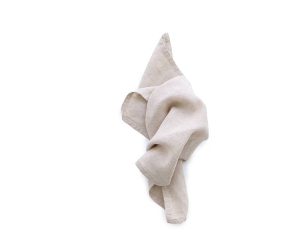 istock Flat lay with beige linen kitchen napkin isolated on white background. Folded cloth for mockup 2149081444