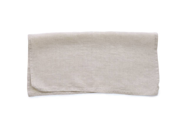istock Flat lay with beige linen kitchen napkin isolated on white background. Folded cloth for mockup 2149081449