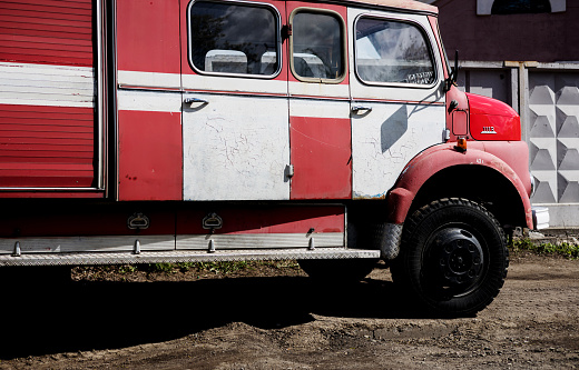 Minsk, Belarus, April 18, 2024 - Red Mercedes-Benz 1113 fire truck, side view. antique german auto