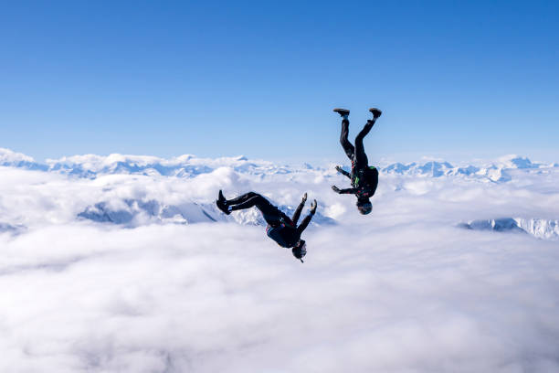 istock Freefall jumpers face each other mid-air 2149083381