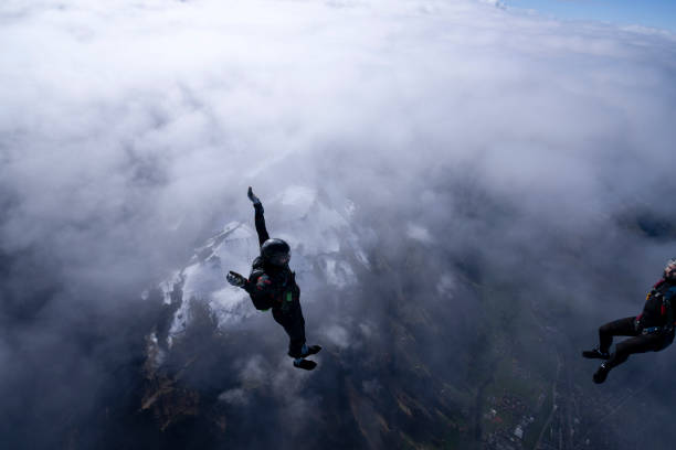 istock Freefall jumpers face each other mid-air 2149083698