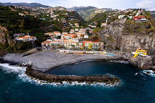 Ponta do Sol in Madeira Island, Portugal. Aerial drone view at cityscape of coastal town and beach