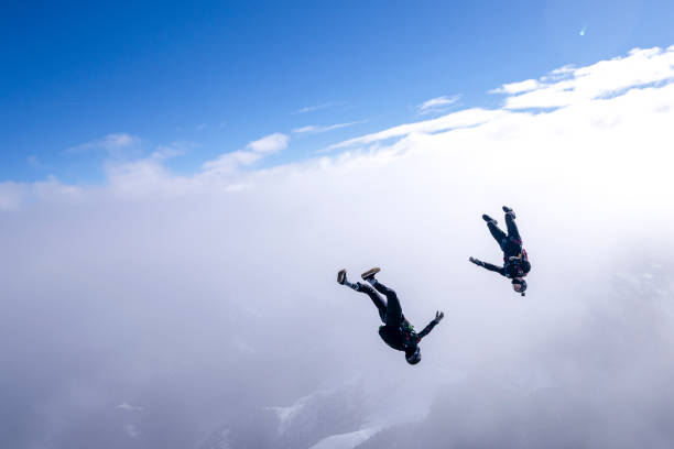 istock Freefall jumpers face each other mid-air 2149083741