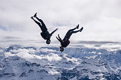 Freefall jumpers face each other mid-air