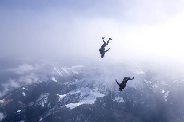 istock Freefall jumpers face each other mid-air 2149083842