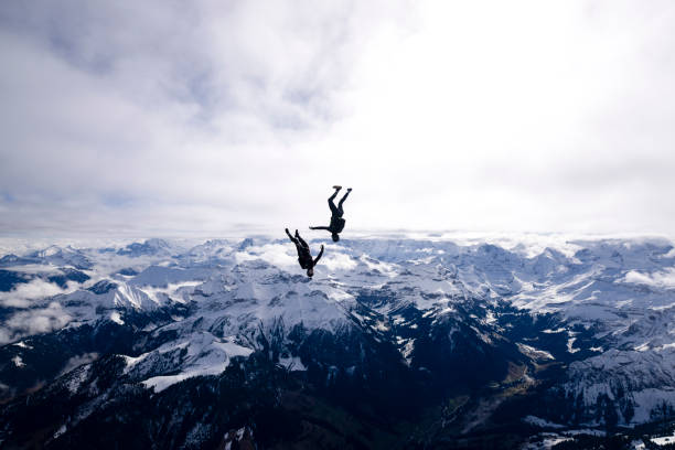 istock Freefall jumpers face each other mid-air 2149083894