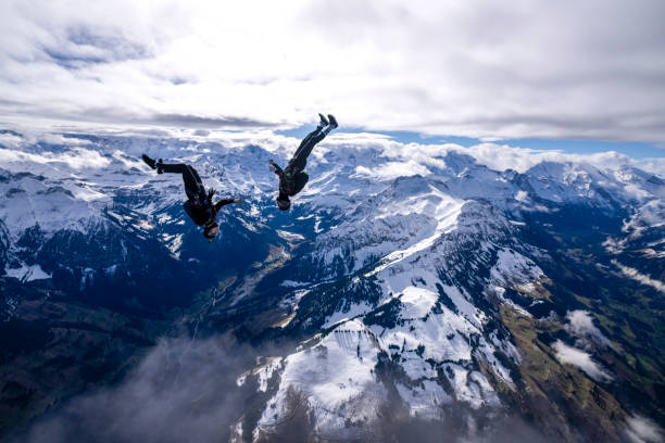 istock Freefall jumpers face each other mid-air 2149083910