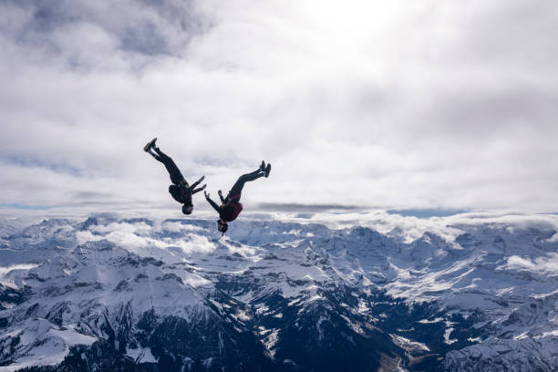 istock Freefall jumpers face each other mid-air 2149083945