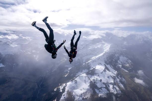 istock Freefall jumpers face each other mid-air 2149083969