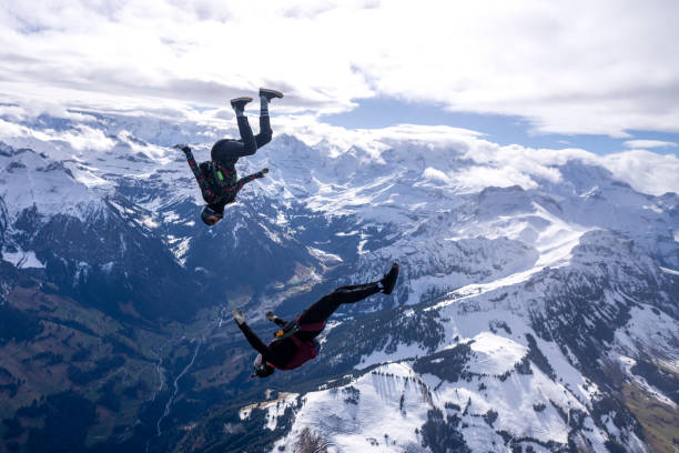 istock Freefall jumpers face each other mid-air 2149083970
