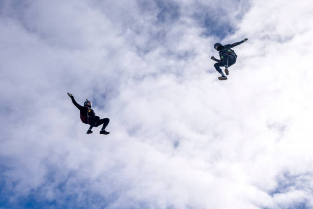 istock Freefall jumpers face each other mid-air 2149083985
