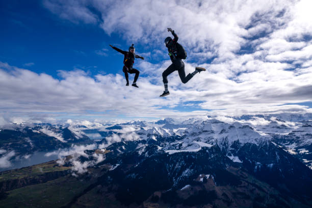 istock Freefall jumpers face each other mid-air 2149084063
