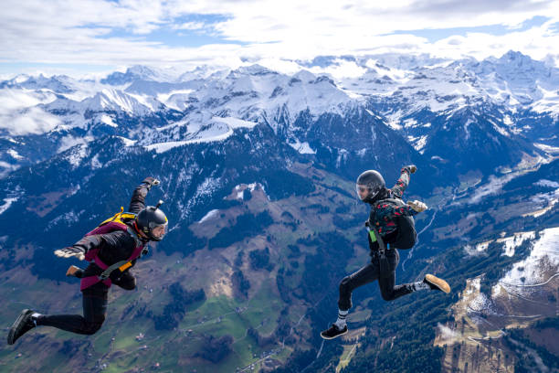 istock Freefall jumpers face each other mid-air 2149084188