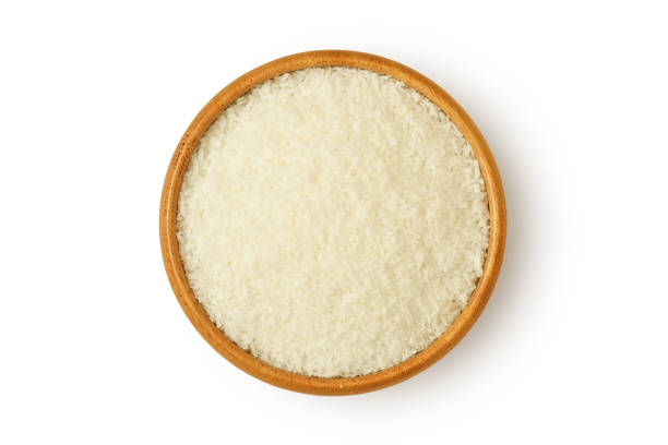 istock Coconut flour in wooden bowl on white background 2149084337