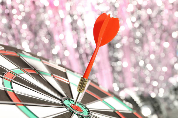 istock Darts hitting the target game at the party. 2149084742