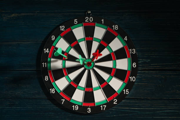 istock Darts for hitting the target, playing darts on a dark background. 2149084925