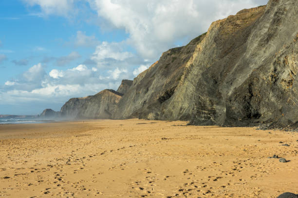 istock Cordoama Beach in Portugal. Atlantic Ocean and rocky cliffs at sandy beach 2149085252
