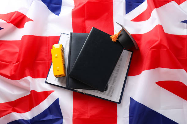 istock A book with a graduation cap and the flag of Great Britain 2149085464