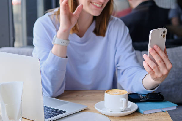 istock Young woman making a video call on the phone 2149085724