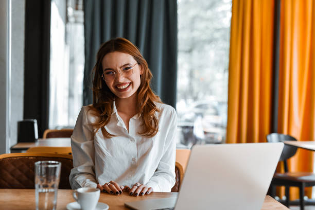 istock Beautiful Smiling Female User Experience Designer Enjoying Working On New Project 2149087016