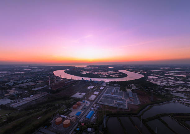 istock Panoramic aerial view of a power plant on a riverside drone. 2149087407