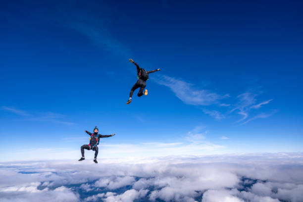 istock Freefall jumpers face to face in mid-air 2149089830