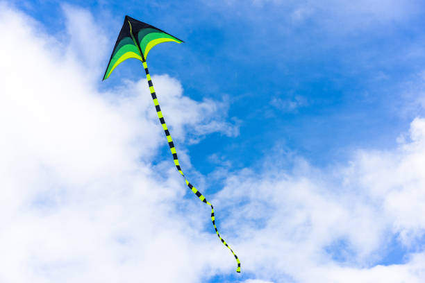 istock Colorful kite flying on sky background 2149090016