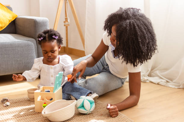 istock Mother and child enjoying playtime on floor 2149091516
