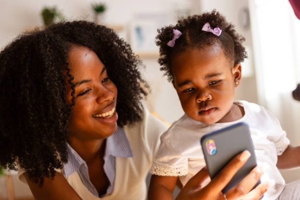 istock Mother and daughter enjoying smartphone time together 2149092115