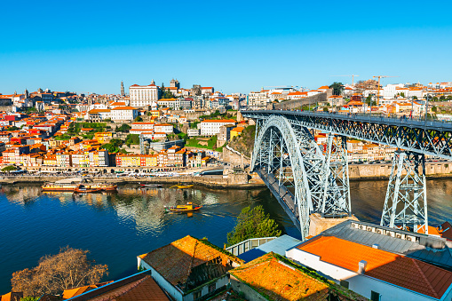 Porto, Portugal. Panoramic view of the old town and bridge Ponte Luis I over Douro river at sunny day. Famous travel destination