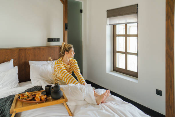 istock Waking up in a hotel room 2149095487