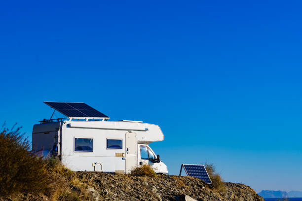 istock Caravan with tilt solar panels on roof. 2149097877