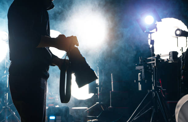 istock Photographer in Front of Studio Lighting Equipment 2149099997