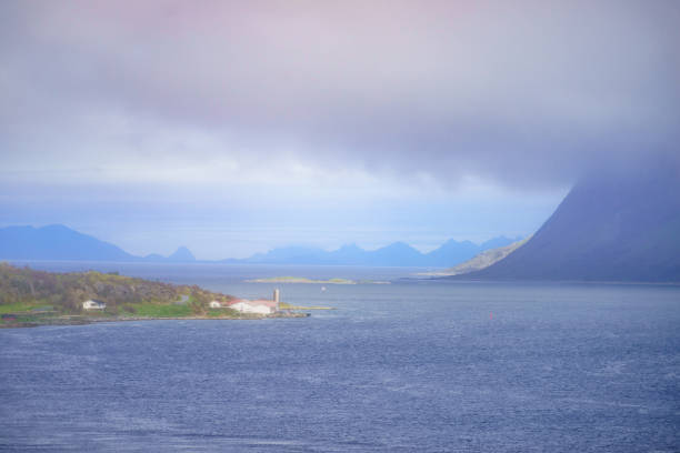 Sea fjord landscape, Lofoten islands, Norway. Hazy day, overcast weather.