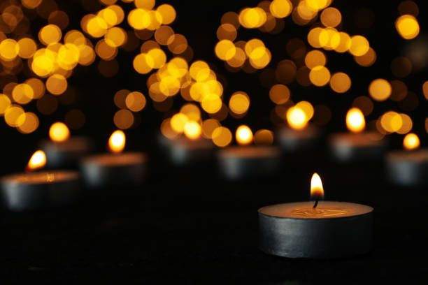 istock Concept of sadness and sorrow - sorrow candles 2149101528