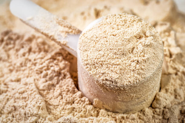 istock Plastic scoop full of protein powder 2149102010