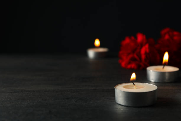 istock Concept of sadness and sorrow - sorrow candles 2149102025