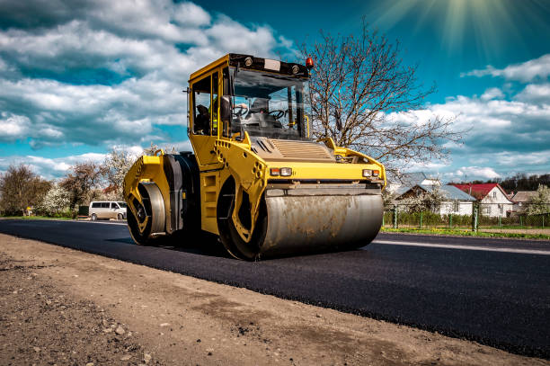 istock Road roller rolling new hot asphalt on the new road. Road construction. 2149102260