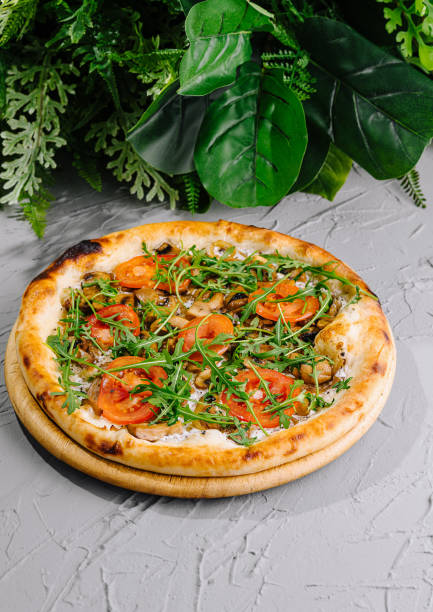 istock Fresh gourmet vegetarian pizza with arugula 2149102389