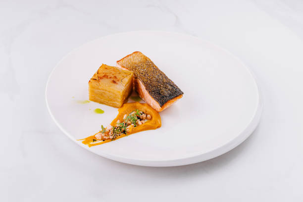 istock Gourmet salmon fillet on elegant white plate 2149102538
