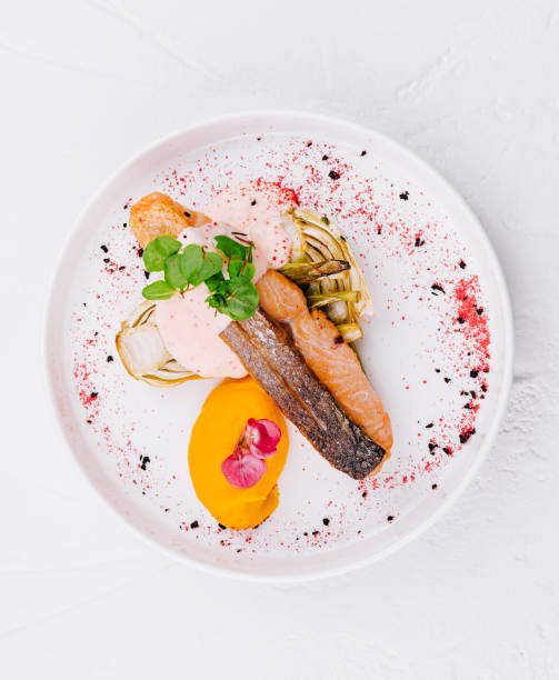 istock Gourmet salmon dish with colorful garnish 2149105157