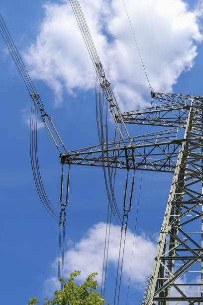 istock Close up view on a big power pylon transporting electricity in a countryside area 2149105853