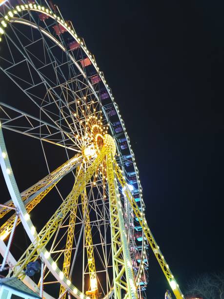 istock Ferris wheel on a background of the starry night sky 2149106650