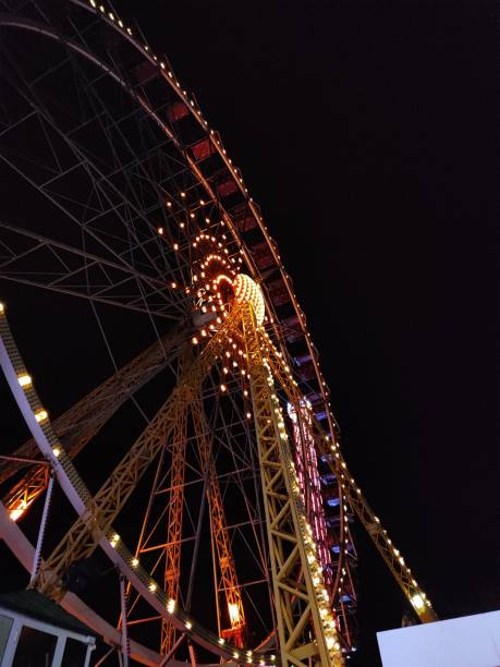 istock Ferris wheel on a background of the starry night sky 2149106781