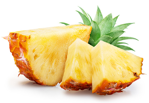 Ripe pineapple slices isolated on white background. File contains clipping path.