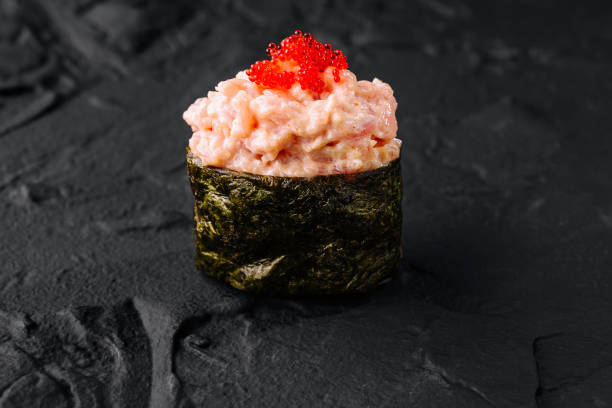 istock Gourmet spicy tuna sushi with red caviar 2149107052