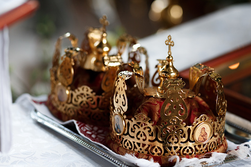Golden church crowns for sacramental weddings